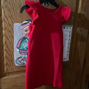 Beautiful dress. Well made. Back zipper.